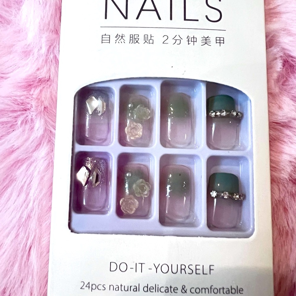 $15 for two. Elegant Green and Silver Press-On Nails